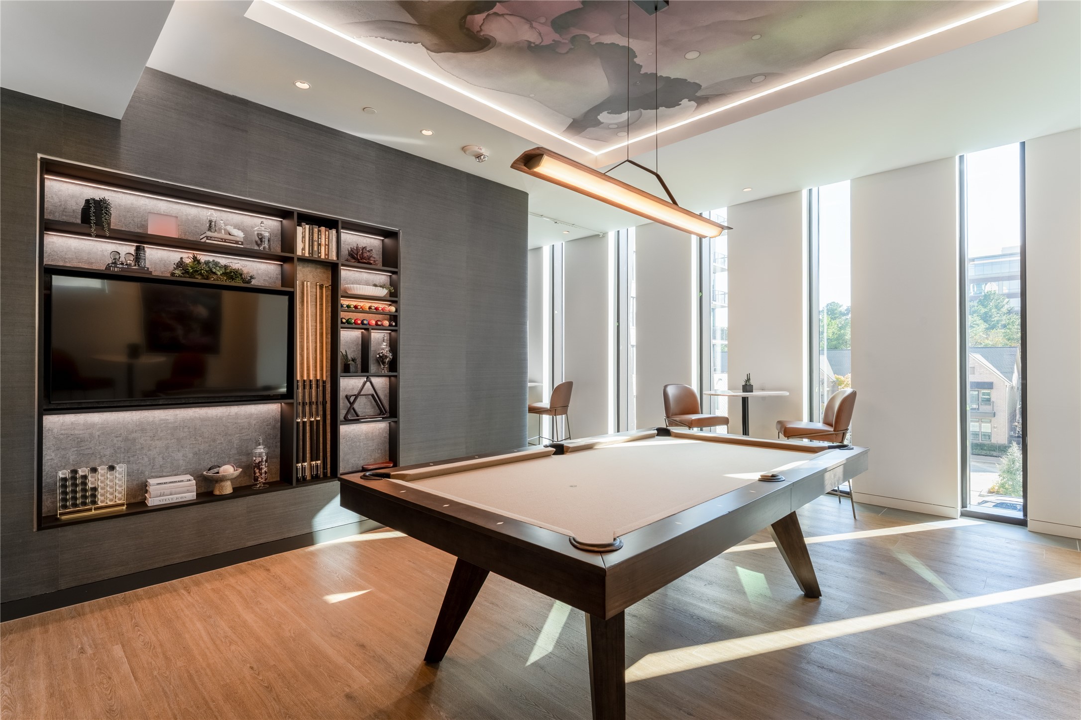 1 Riva Row, Unit 165 The Woodlands, TX 77380 - Photo 23 of 45 a room with pool table and windows