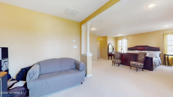 a living room with furniture and a couch