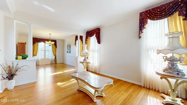 a room with furniture and a wooden floor
