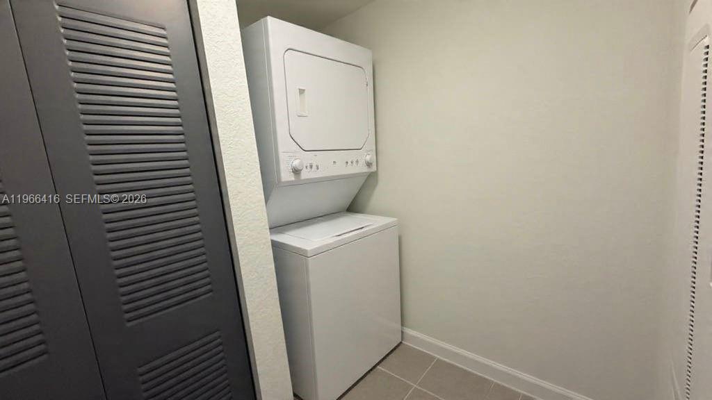 12420 Southwest 248th Street, Unit 10 Homestead, FL 33032 - Photo 7 of 16 a utility room with dryer and washer