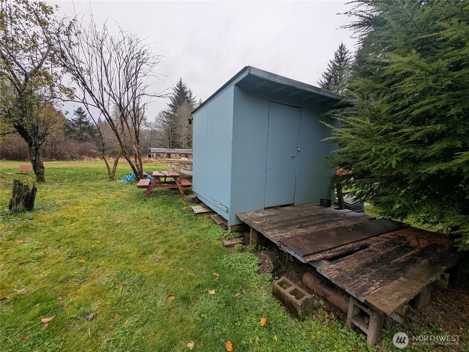 81 Barber Road Clallam Bay, WA 98326 - Photo 15 of 30 a view of a backyard with plants
