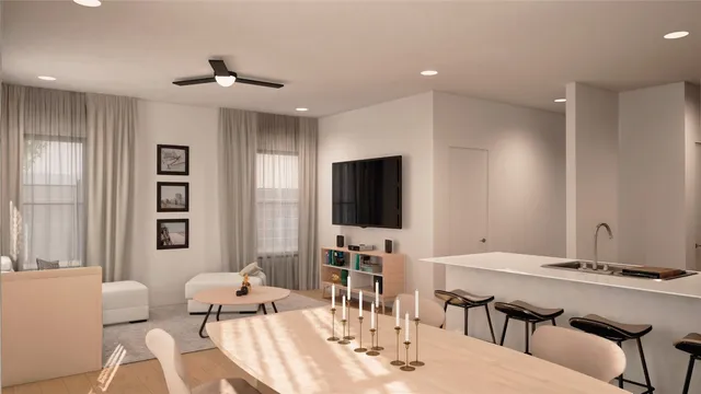 a room with furniture pool table and flat screen tv