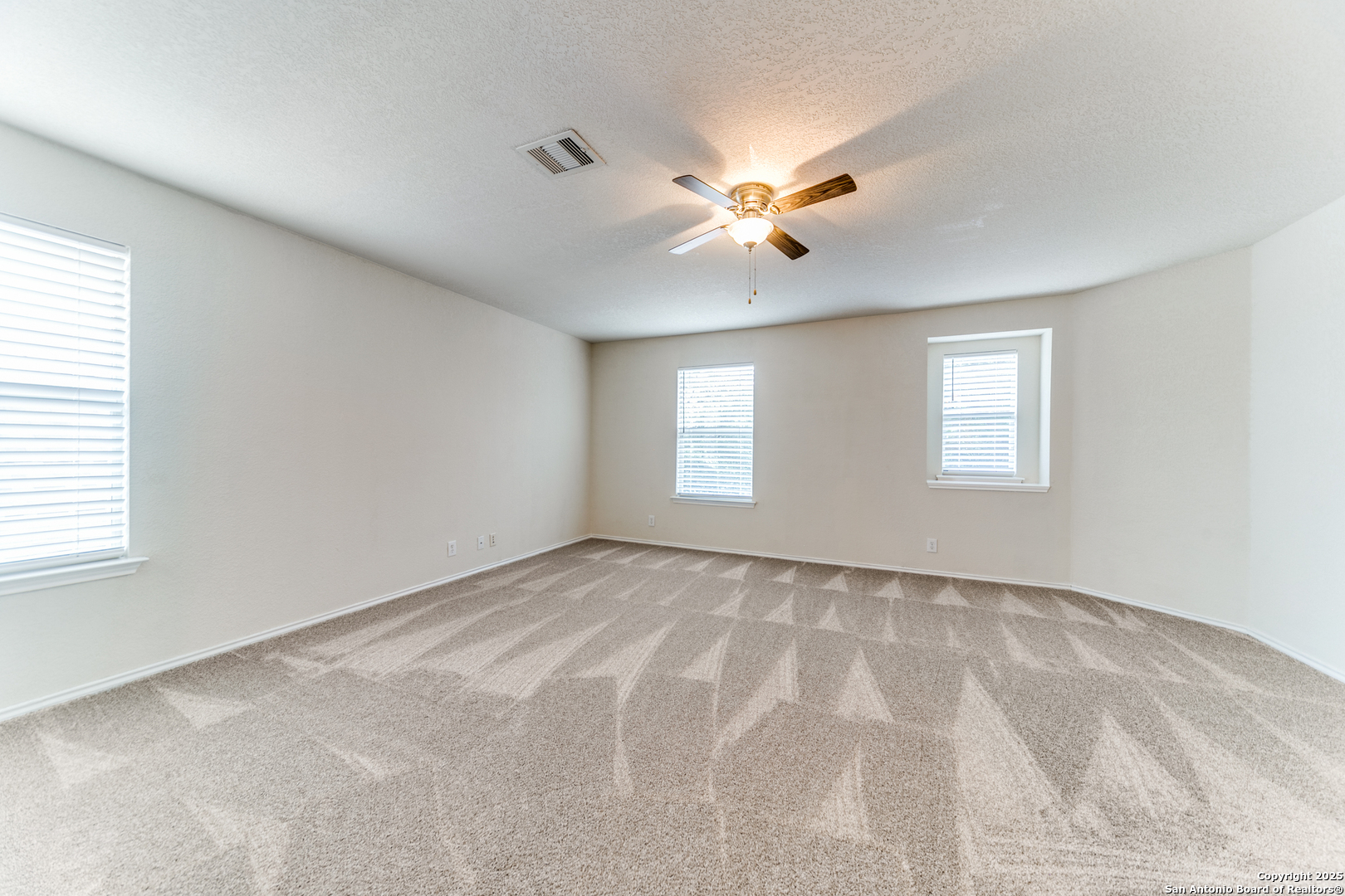 133 Hampton Cove Boerne, TX 78006 - Photo 19 of 24 a view of an empty room with a window
