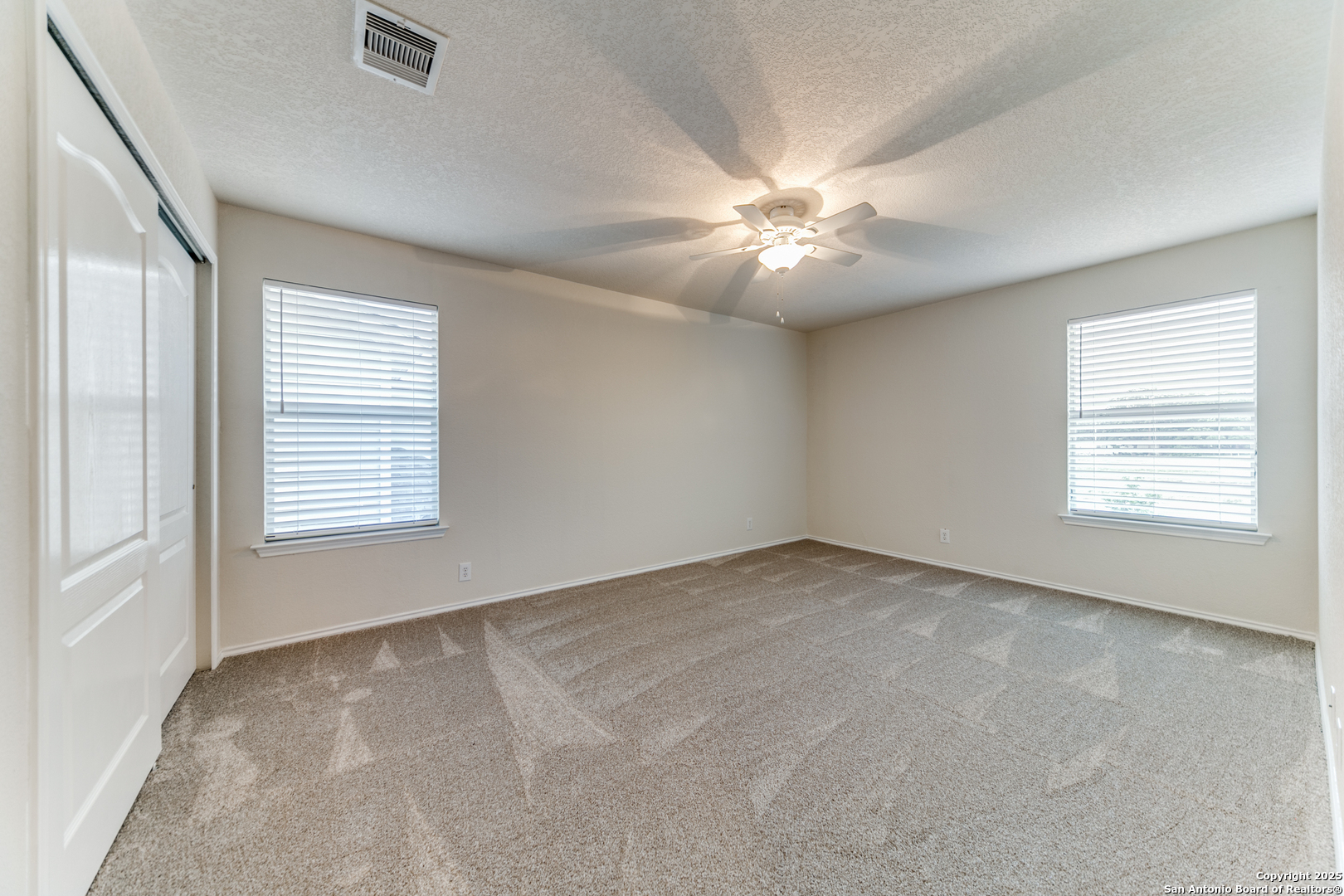 133 Hampton Cove Boerne, TX 78006 - Photo 21 of 24 a view of an empty room with a window