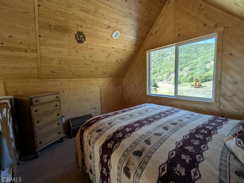 0 Toomes Camp Road Red Bluff, CA 96080 - Photo 16 of 26 a bedroom with a bed and a window