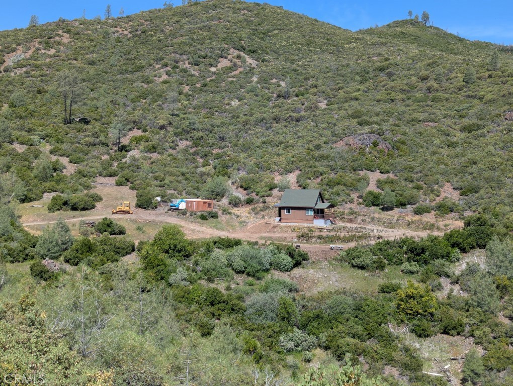 0 Toomes Camp Road Red Bluff, CA 96080 - Photo 2 of 26 a backyard of a house with table and chairs