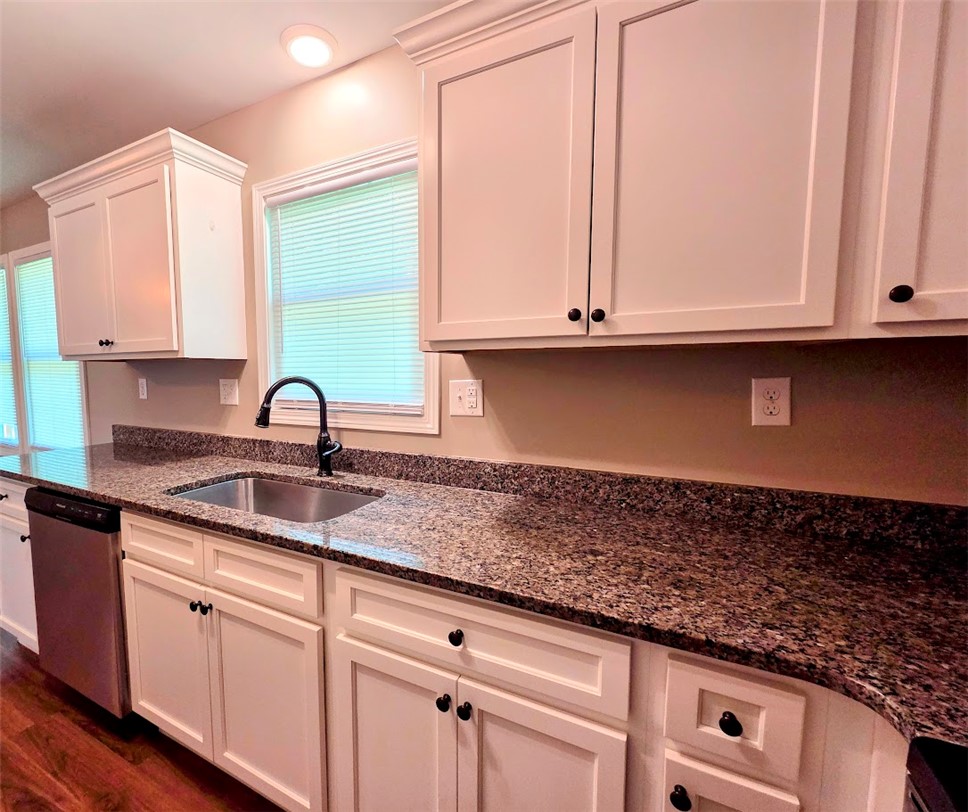 509 Elrod Road Piedmont, SC 29673 - Photo 12 of 28 Well-lit kitchen with sleek countertops and ample storage.