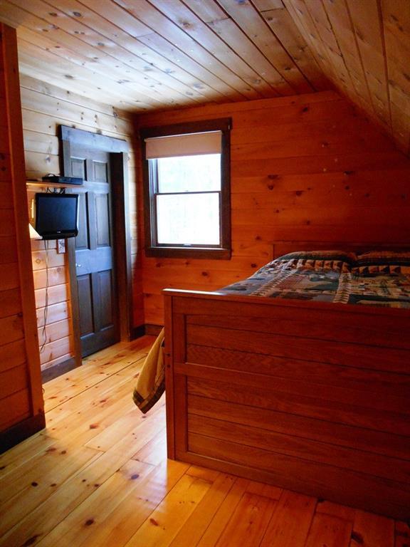 30 Dodge Pond Road Rangeley, ME 04970 - Photo 23 of 35 Spacious guest room with large...