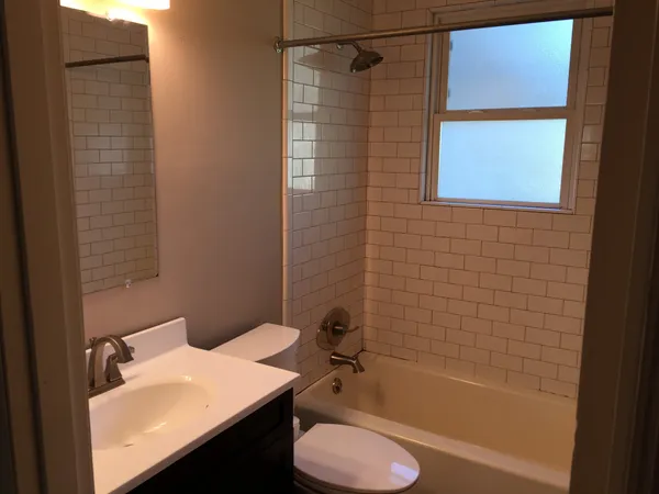 a bathroom with a sink and a bathtub