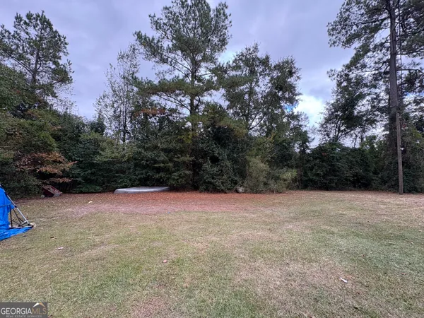a view of outdoor space with trees