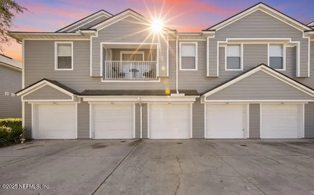 a view of house with yard