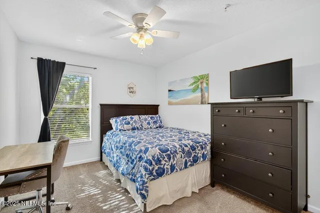a bathroom with a sink toilet a mirror and shower