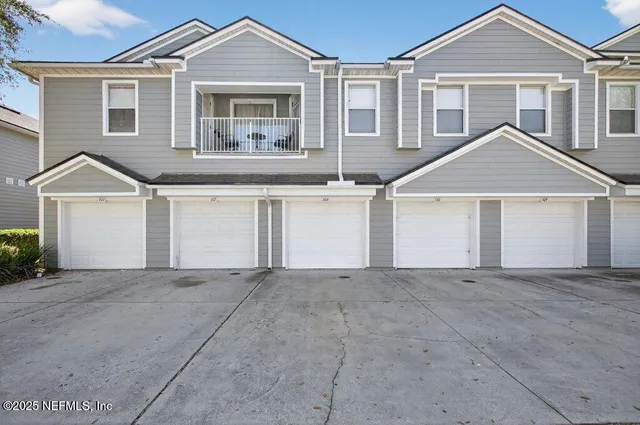 front view of a house and a yard