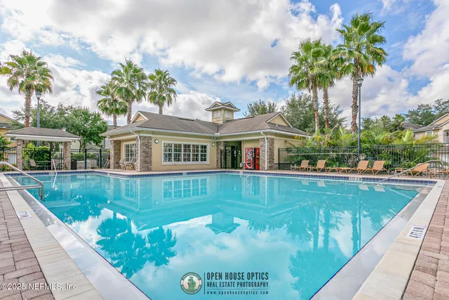 a view of a house with swimming pool