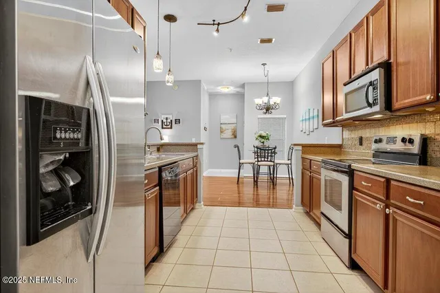 a view of a living room and dining room