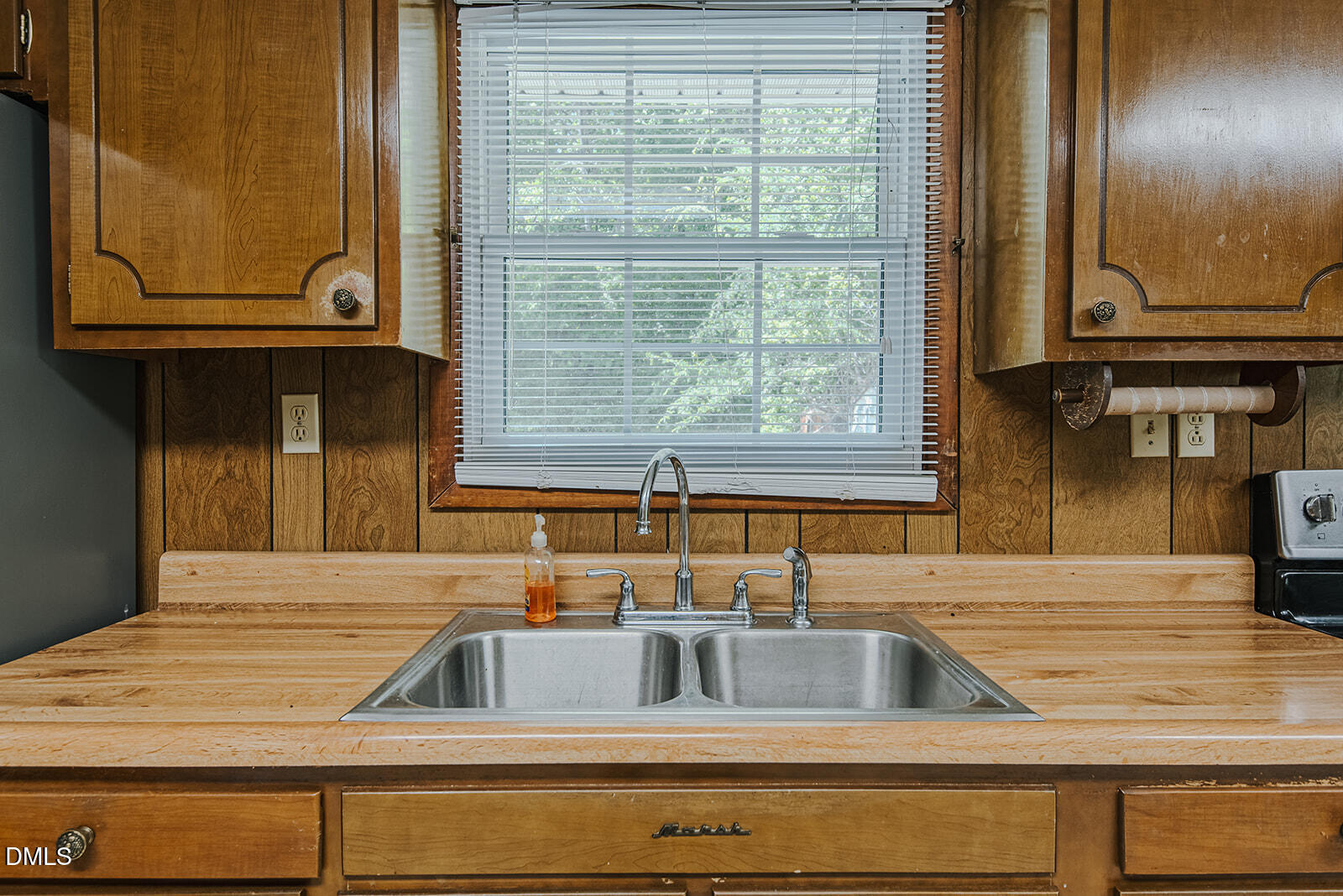 1302 Blacksmith Road Efland, NC 27243 - Photo 6 of 46 a kitchen sink with granite countertop a sink