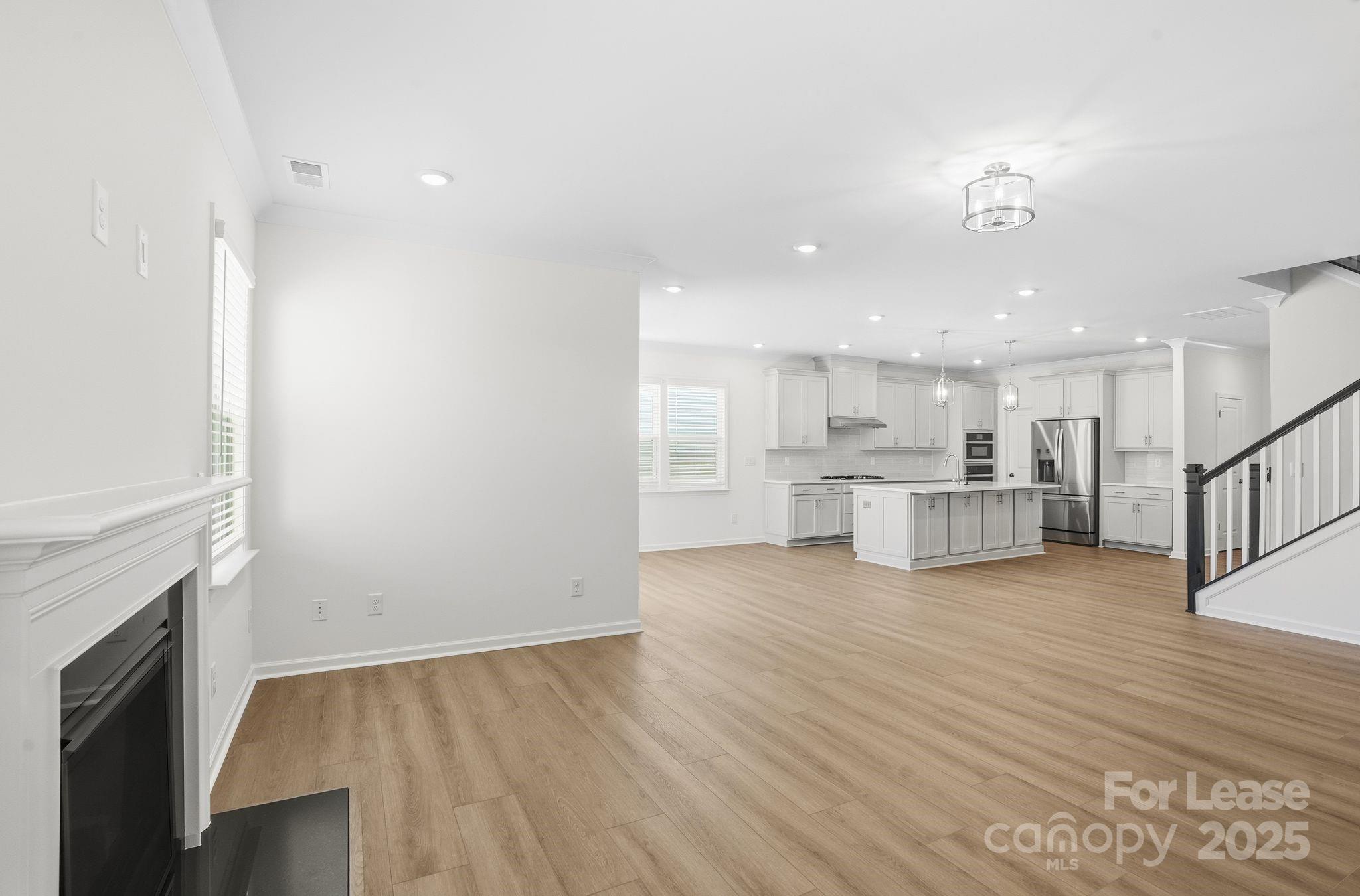10205 Whitaker Pointe Drive Huntersville, NC 28078 - Photo 25 of 48 a view of kitchen with wooden floor