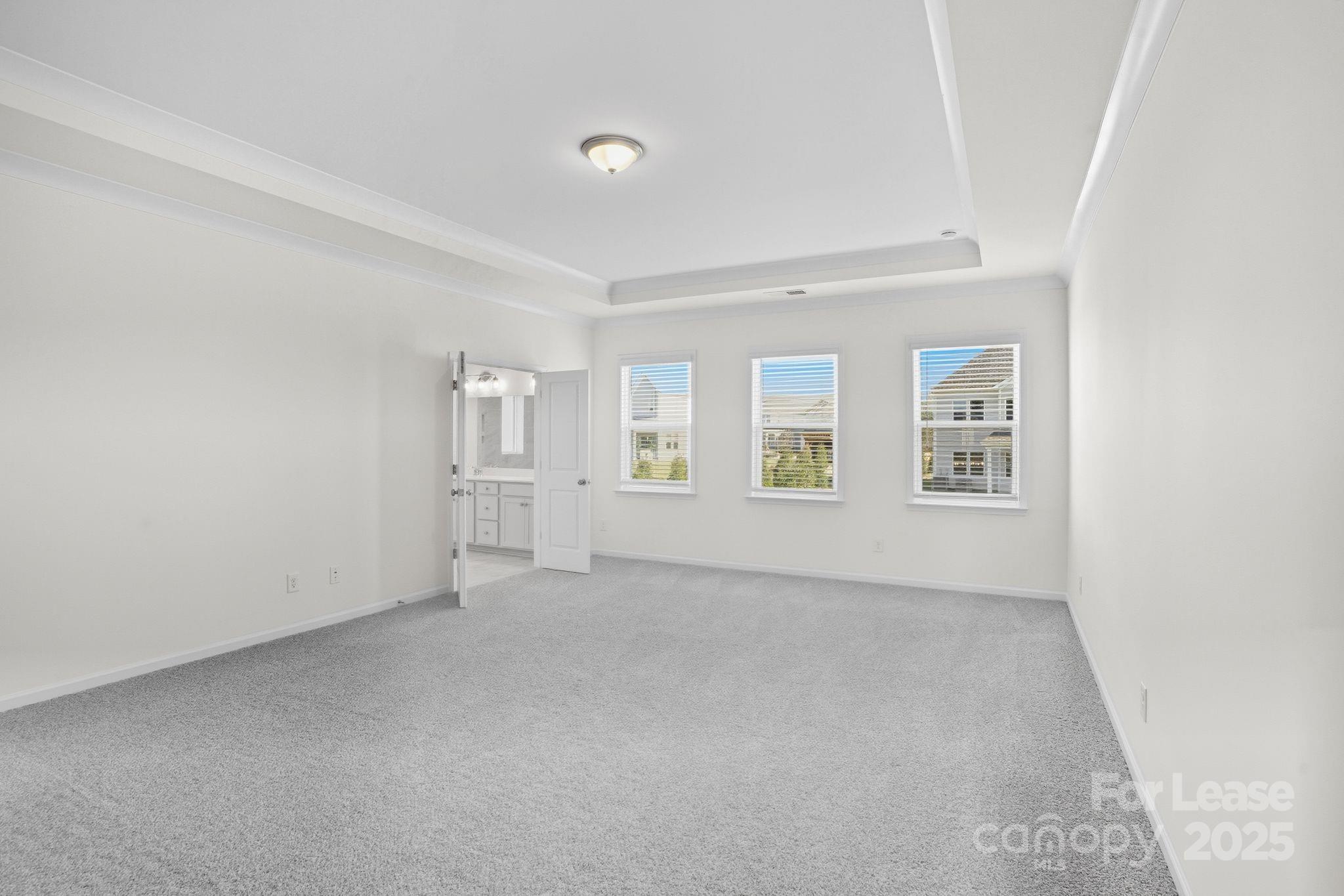 10205 Whitaker Pointe Drive Huntersville, NC 28078 - Photo 46 of 48 an empty room with windows