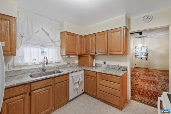 a bathroom with a sink a vanity and a mirror