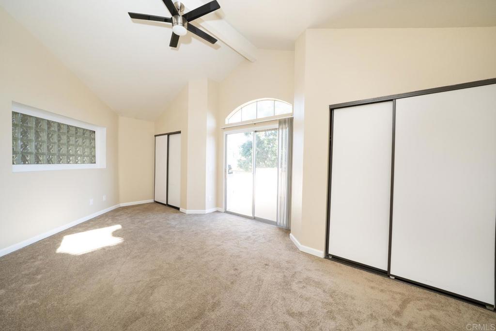 1744 Via Allena Oceanside, CA 92056 - Photo 23 of 36 a view of a livingroom with a ceiling fan and window