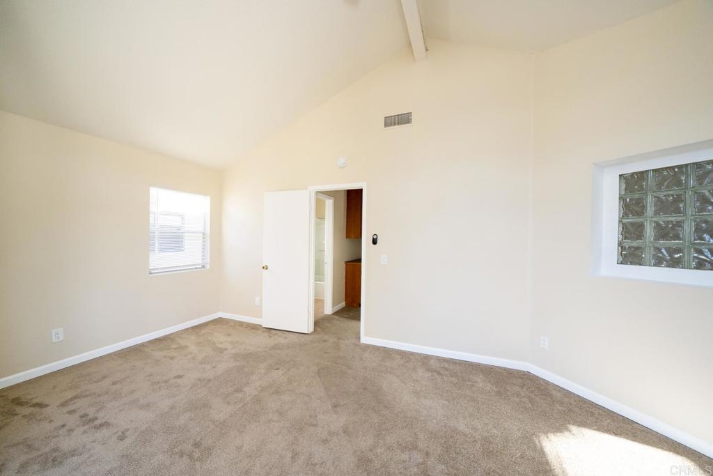 1744 Via Allena Oceanside, CA 92056 - Photo 27 of 36 an empty room with windows