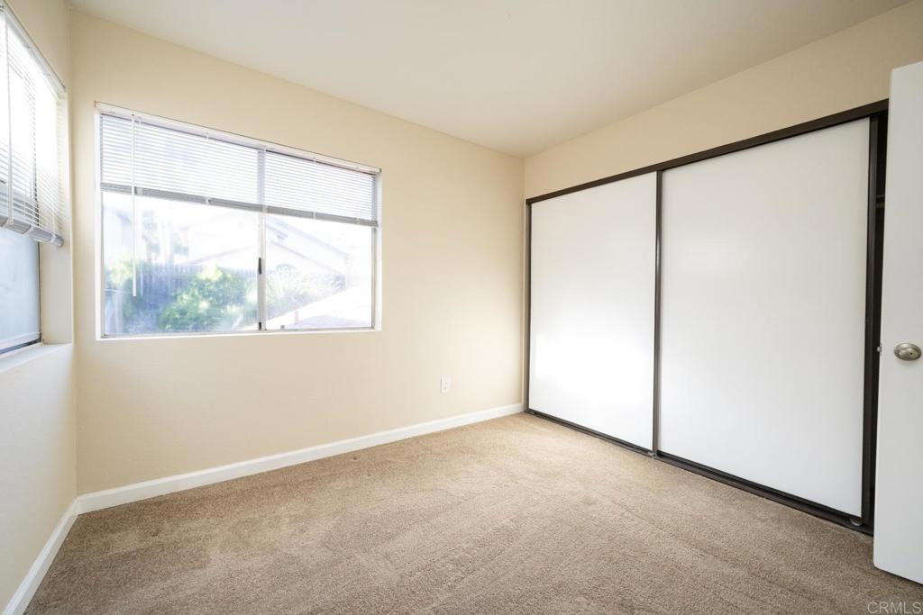 1744 Via Allena Oceanside, CA 92056 - Photo 28 of 36 an empty room with a window