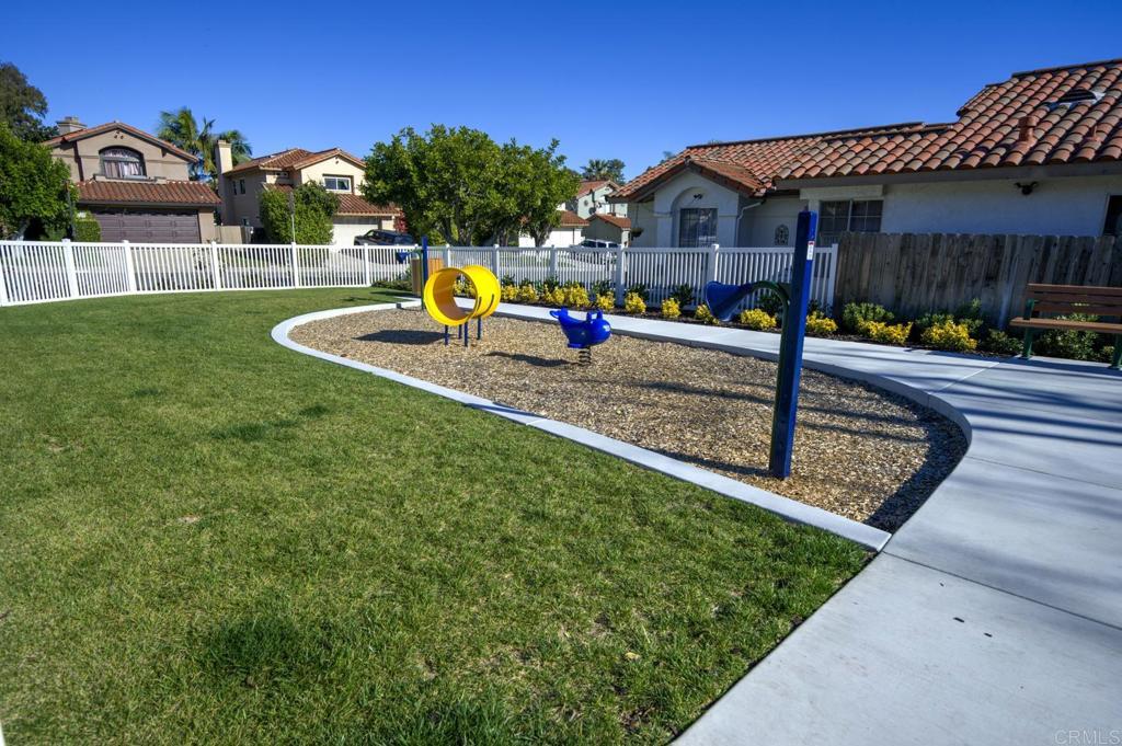 1744 Via Allena Oceanside, CA 92056 - Photo 33 of 36 a view of a house with a yard