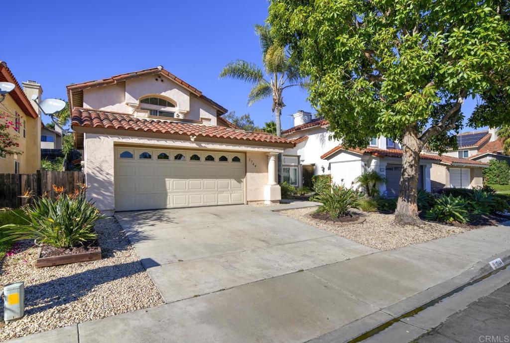 1744 Via Allena Oceanside, CA 92056 - Photo 36 of 36 a front view of a house with a yard