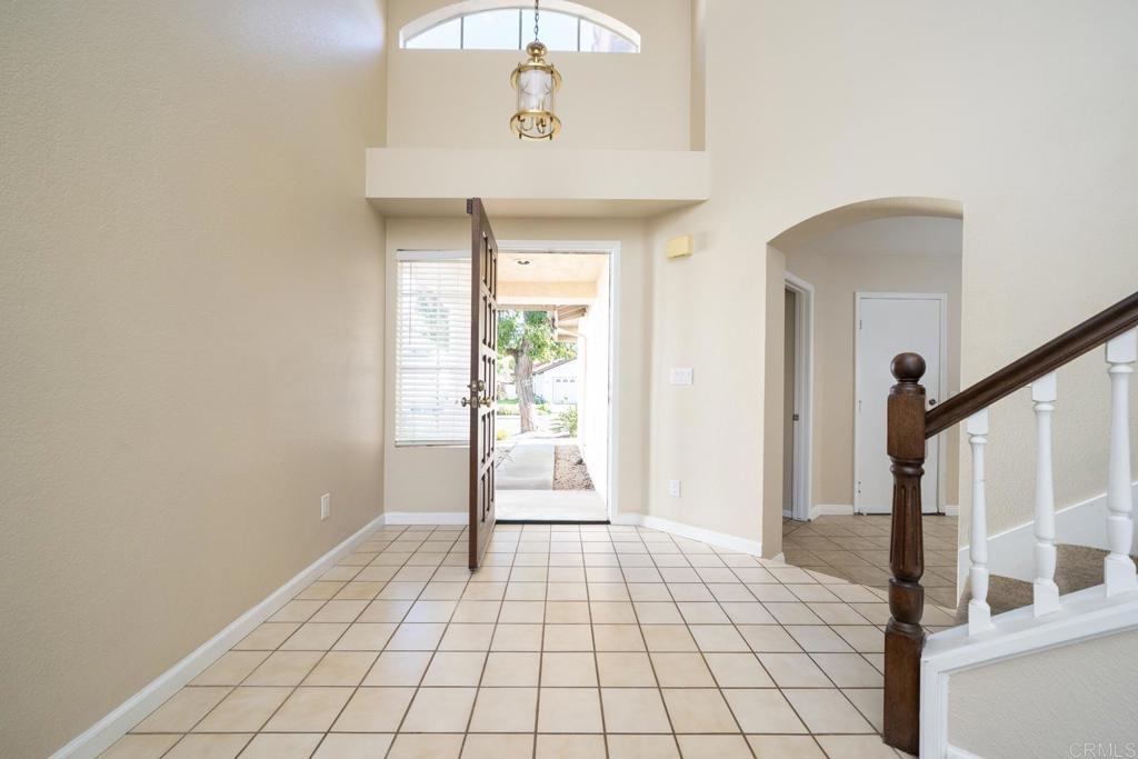 1744 Via Allena Oceanside, CA 92056 - Photo 6 of 36 a view of an entryway with wooden floor