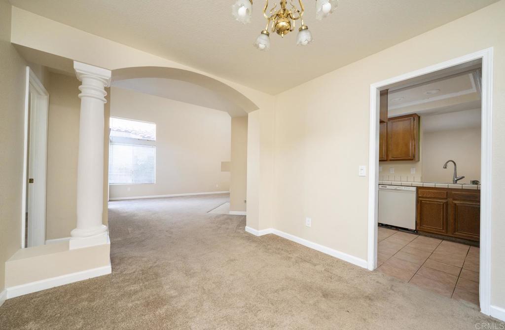 1744 Via Allena Oceanside, CA 92056 - Photo 10 of 36 a view of a kitchen with a sink and dishwasher cabinet