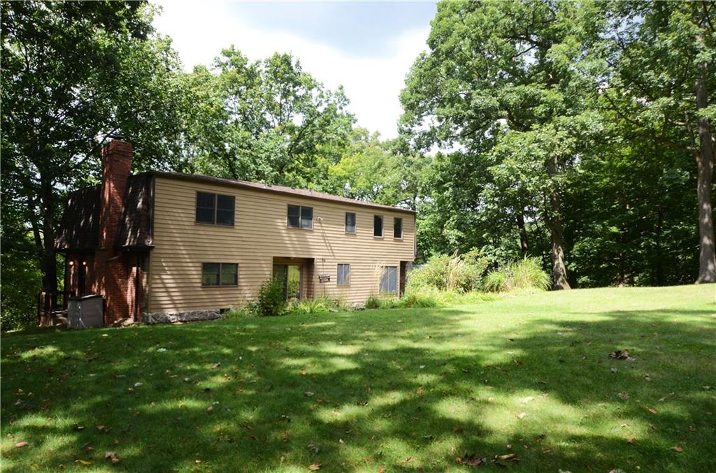 115 Berwyn Road Pittsburgh, PA 15237 - Photo 22 of 25 Great view of the back of the house from the large level backyard.