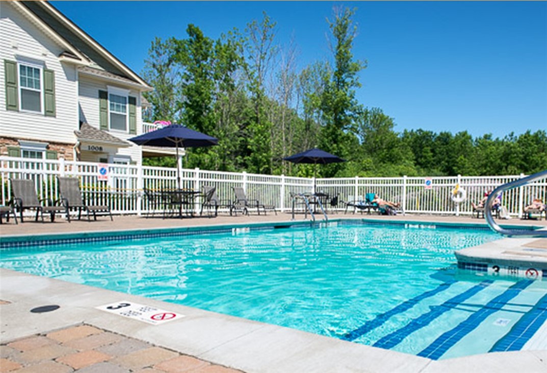 1260 Lehigh Station Road, Unit 408 Henrietta, NY 14467 - Photo 10 of 14 Lehigh Park heated swimming pool and pool deck are