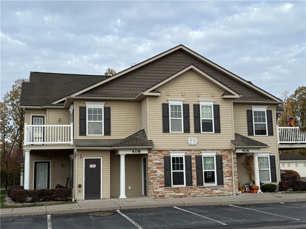 1260 Lehigh Station Road, Unit 408 Henrietta, NY 14467 - Photo 9 of 14 Exterior of 408's building & adjacent parking