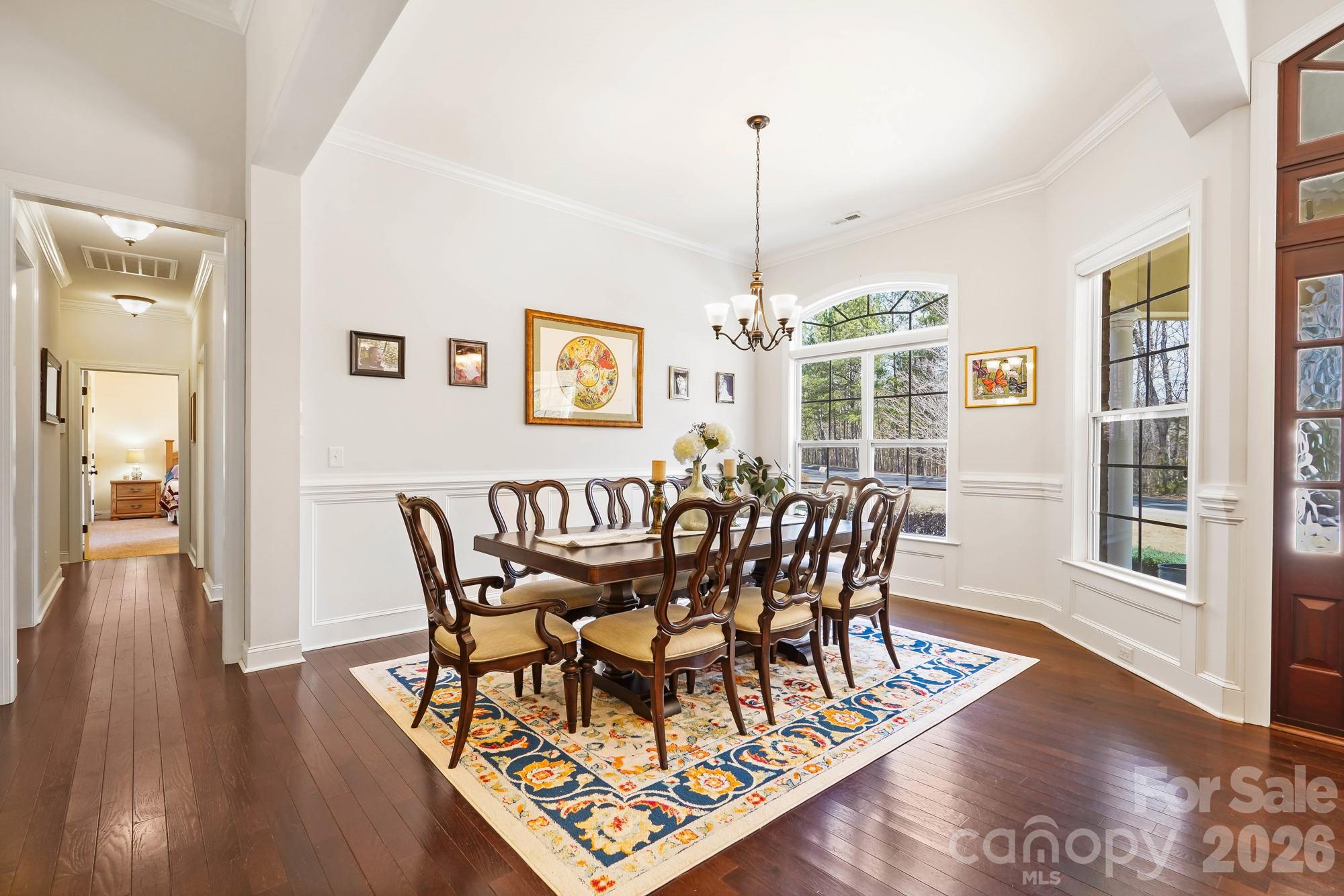 5312 Johnsons Barn Road York, SC 29745 - Photo 11 of 46 a view of a dining room with furniture window and wooden floor