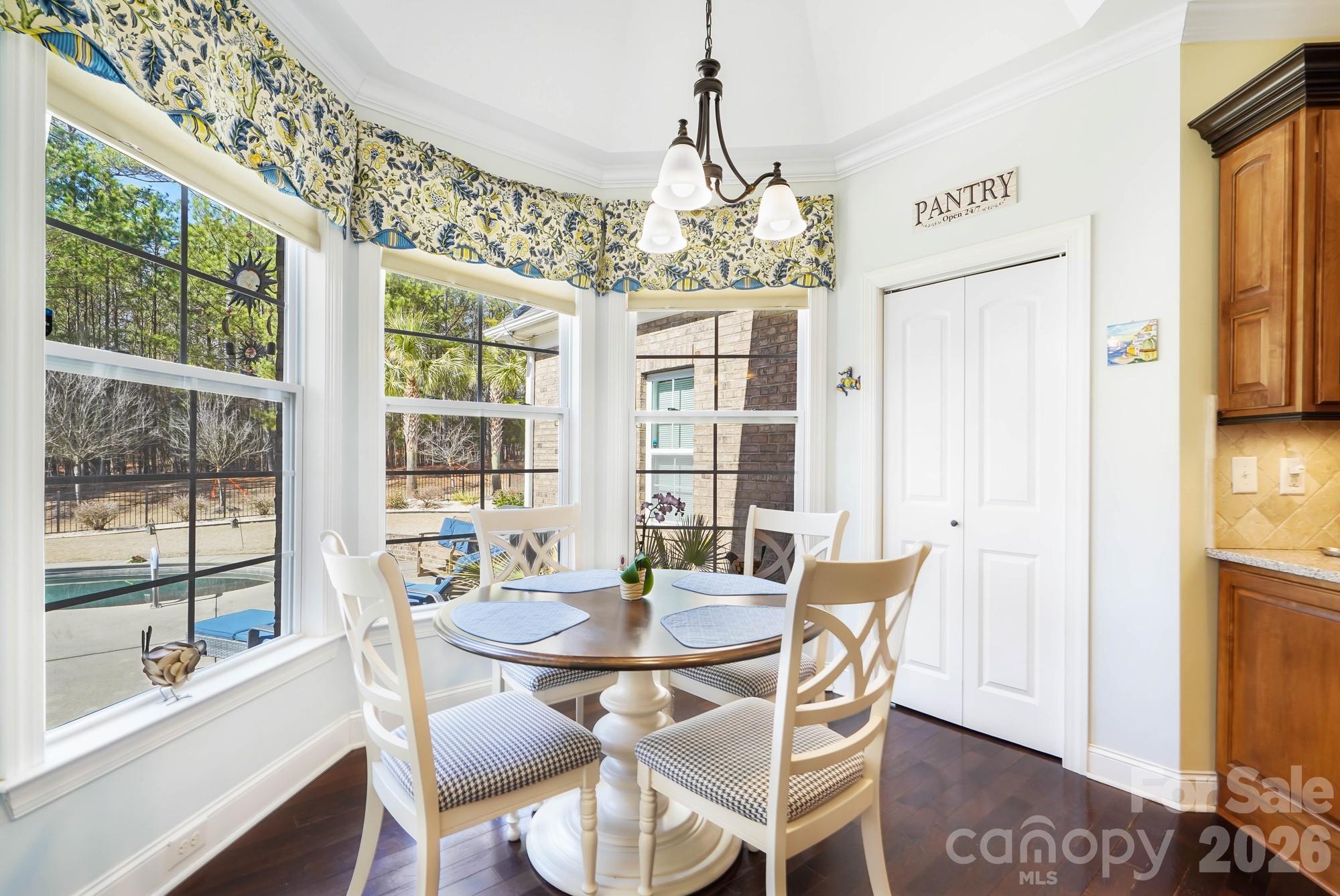 5312 Johnsons Barn Road York, SC 29745 - Photo 17 of 46 a view of a dining room with furniture window and outside view