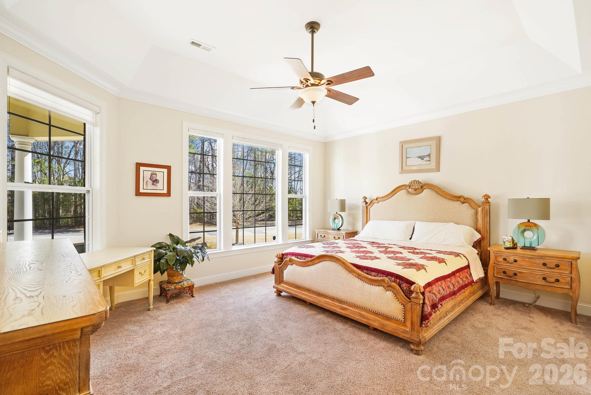 5312 Johnsons Barn Road York, SC 29745 - Photo 24 of 46 a bedroom with a bed couch and a window