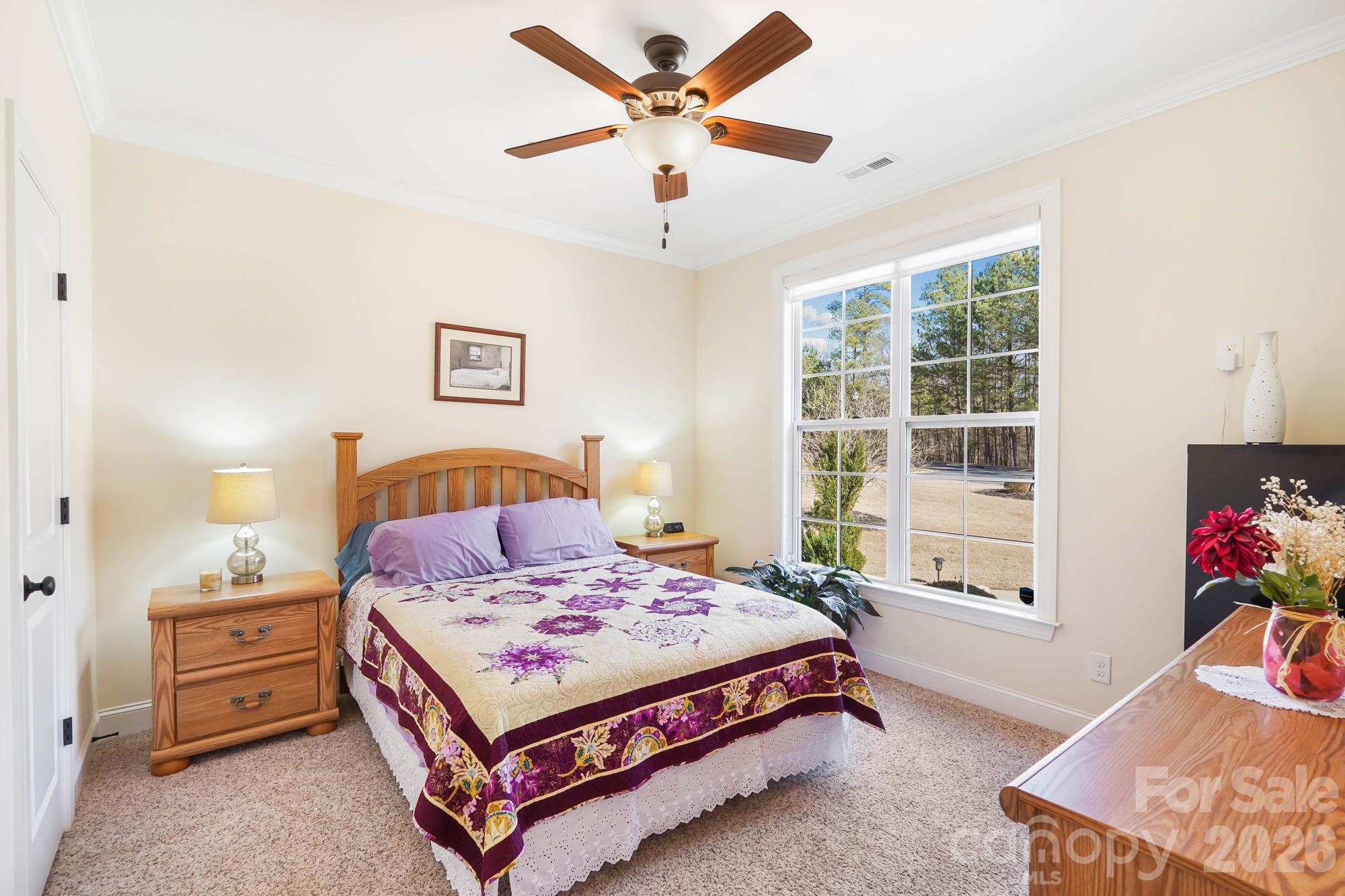 5312 Johnsons Barn Road York, SC 29745 - Photo 31 of 46 a bedroom with a bed and a window