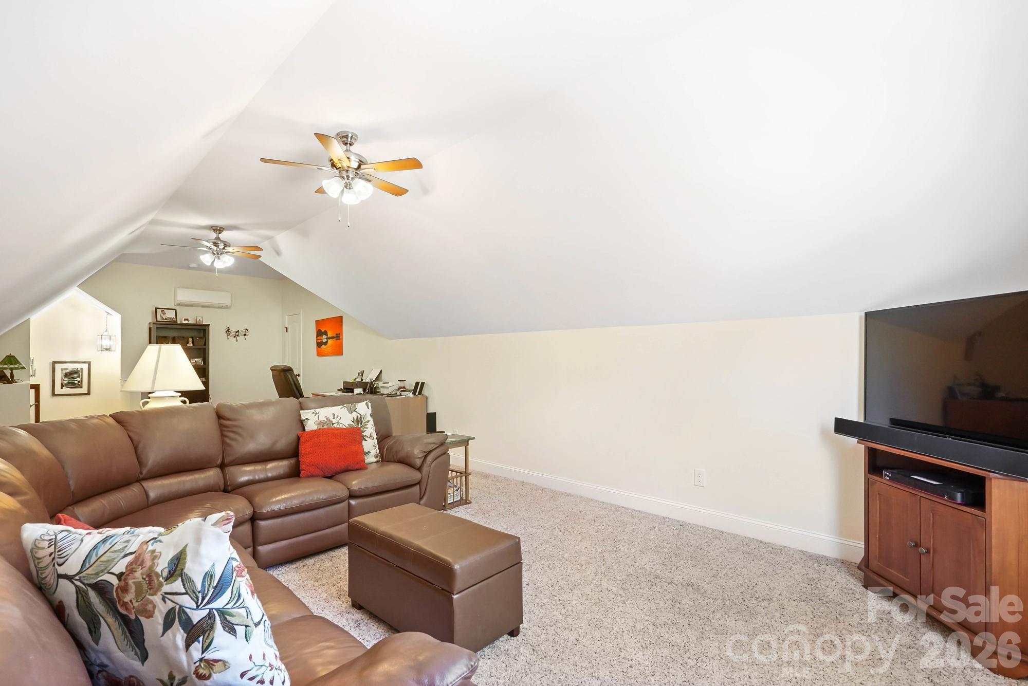 5312 Johnsons Barn Road York, SC 29745 - Photo 35 of 46 a living room with furniture and a flat screen tv