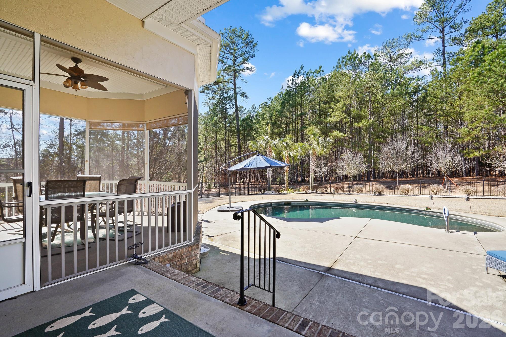 5312 Johnsons Barn Road York, SC 29745 - Photo 37 of 46 a view of a patio with a table and chairs