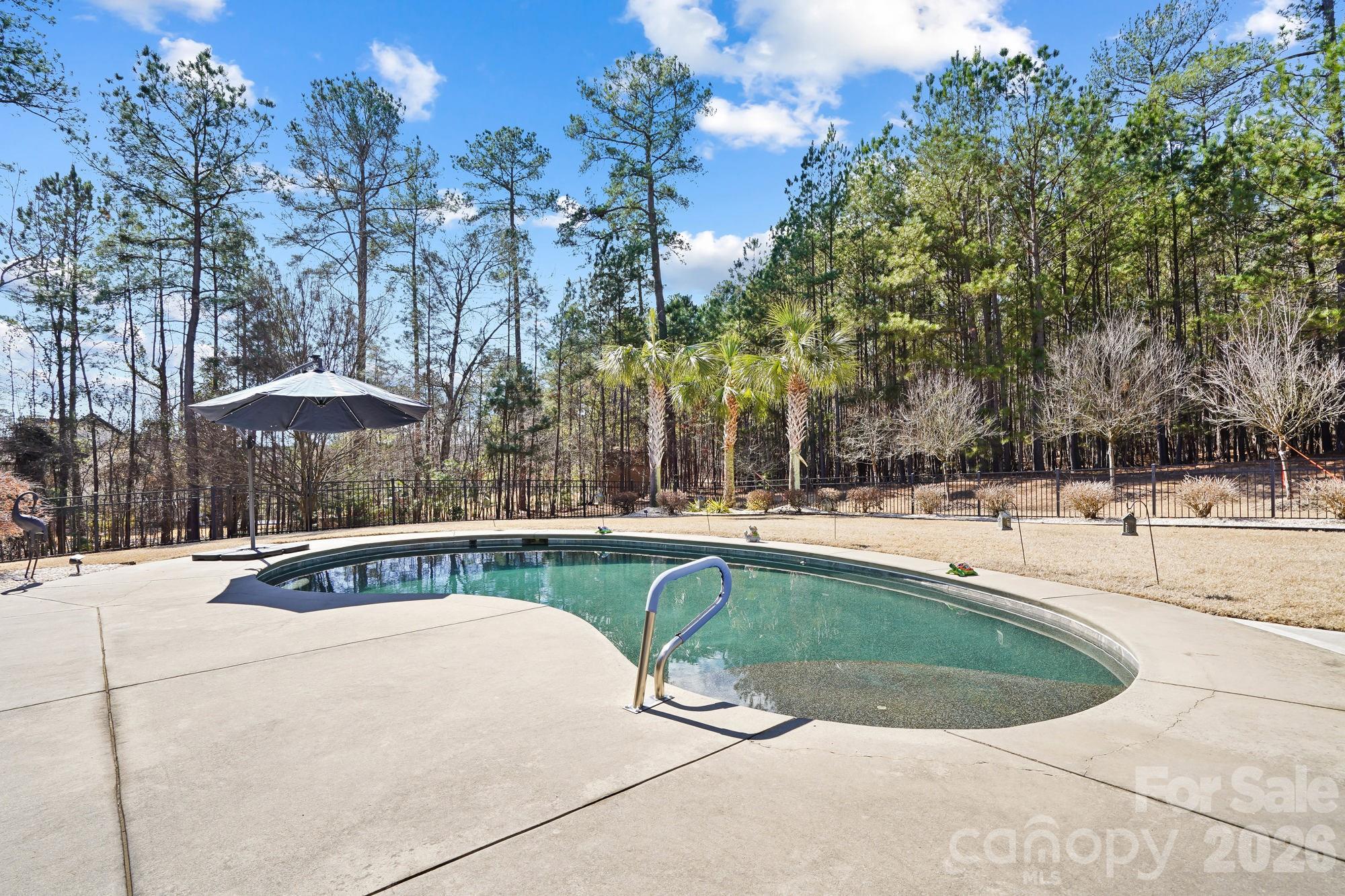 5312 Johnsons Barn Road York, SC 29745 - Photo 38 of 46 a view of a swimming pool with a patio