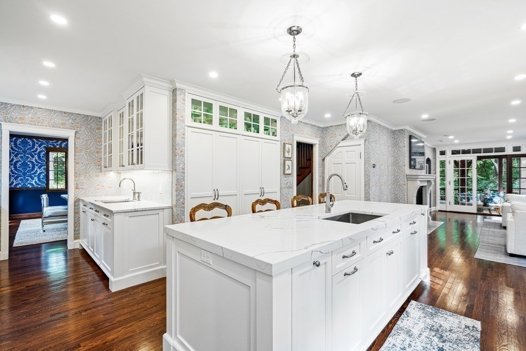 118 Hundreds Road Wellesley, MA 02481 - Photo 6 of 35 a kitchen with sink stove and wooden floor