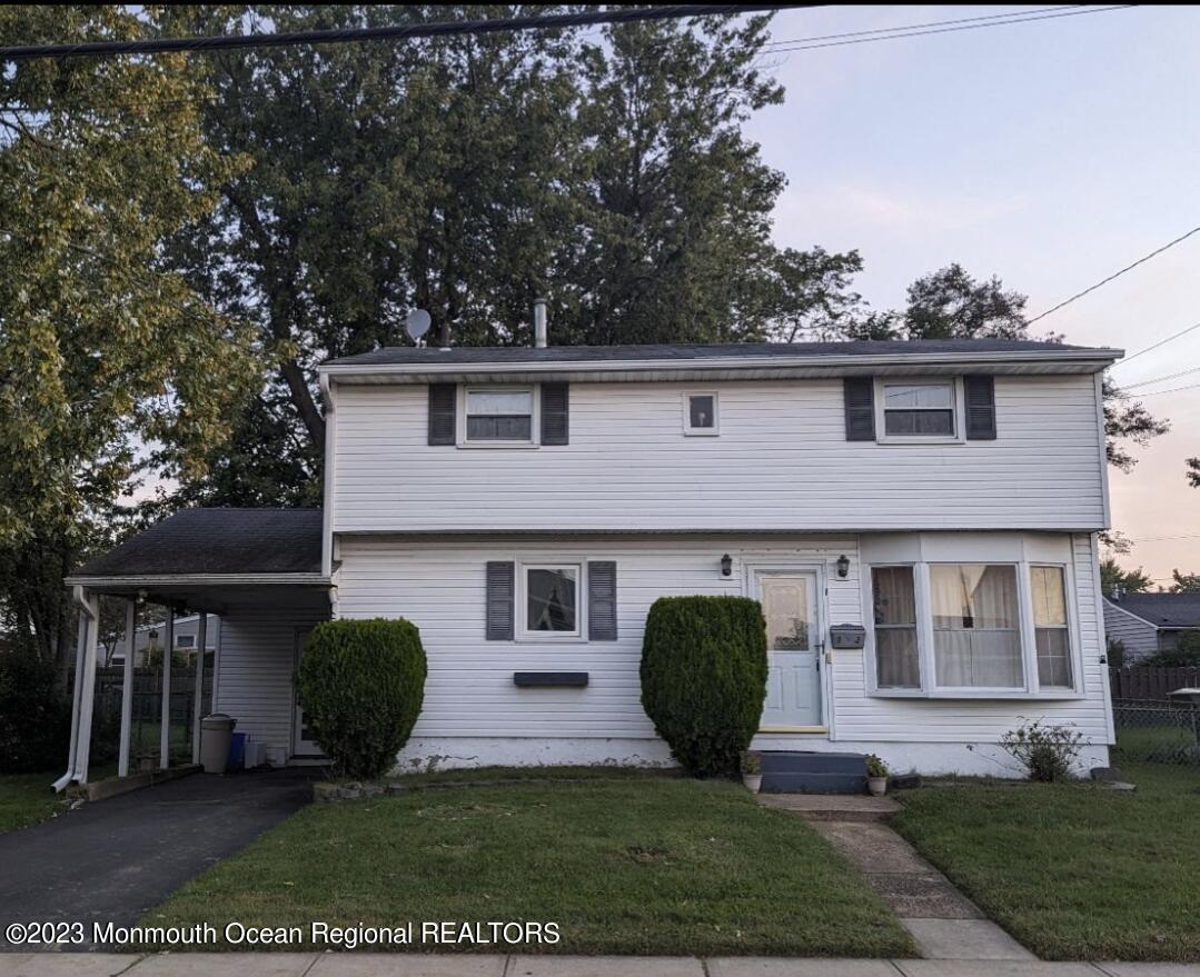 a view of outdoor space yard and front view of a house