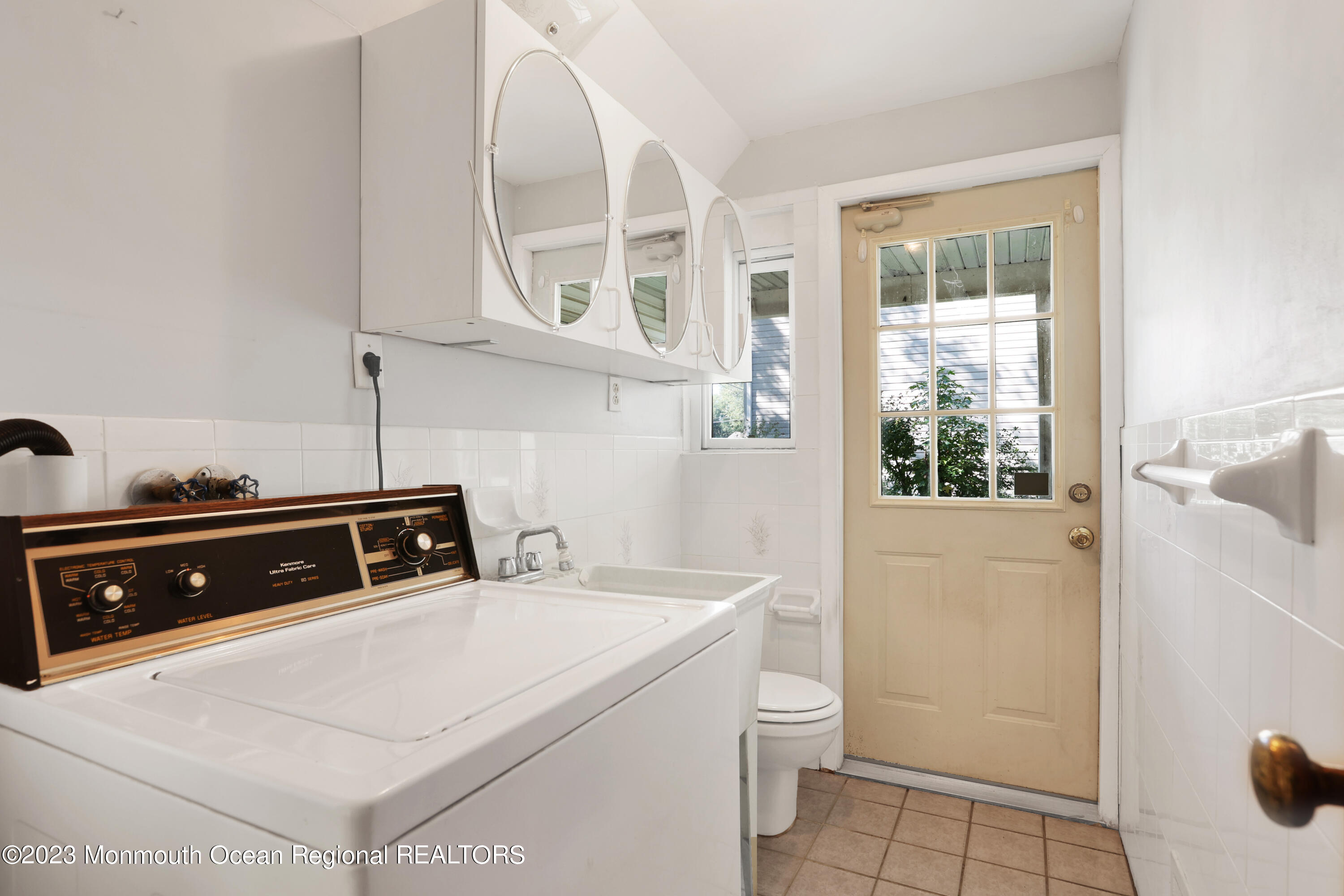 13 Scholer Drive Union Beach, NJ 07735 - Photo 16 of 30 a utility room with stainless steel appliances a sink and a window