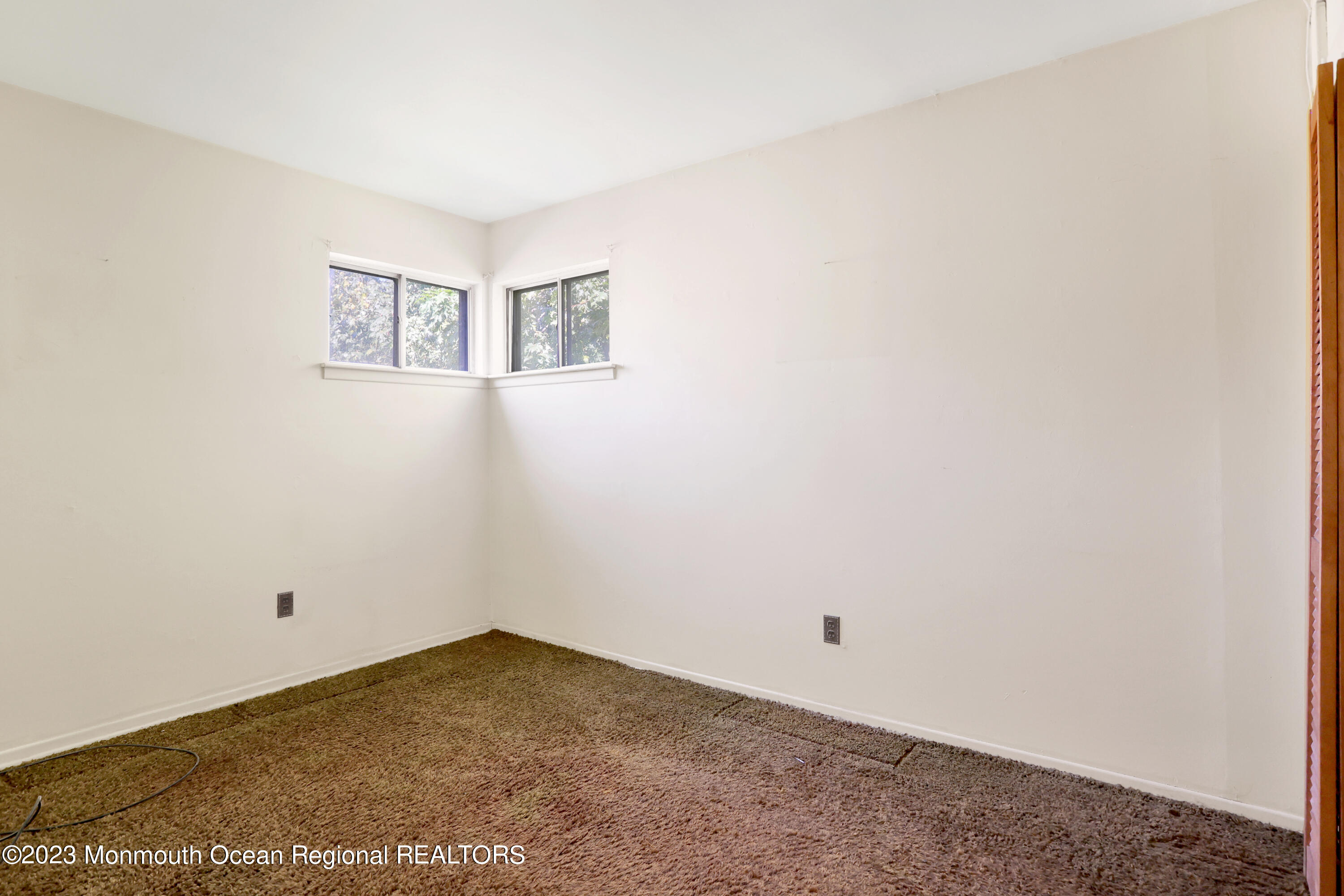 13 Scholer Drive Union Beach, NJ 07735 - Photo 18 of 30 a view of an empty room