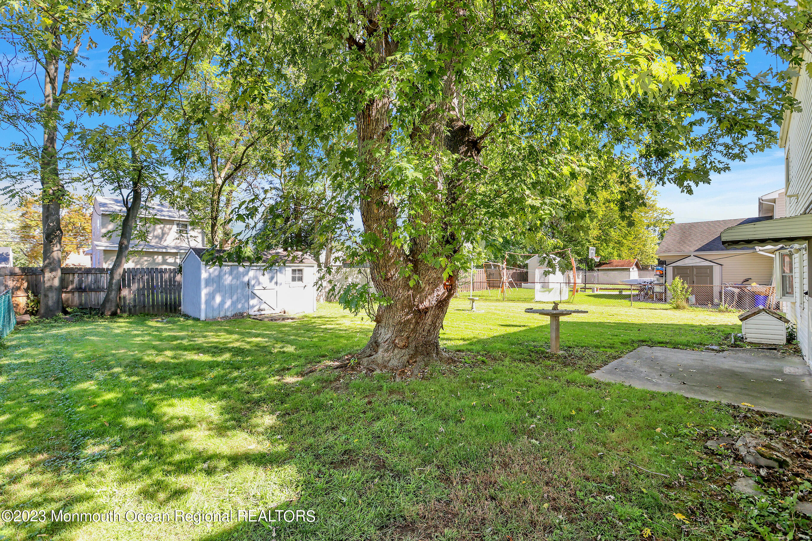 13 Scholer Drive Union Beach, NJ 07735 - Photo 22 of 30 a view of a garden with a tree