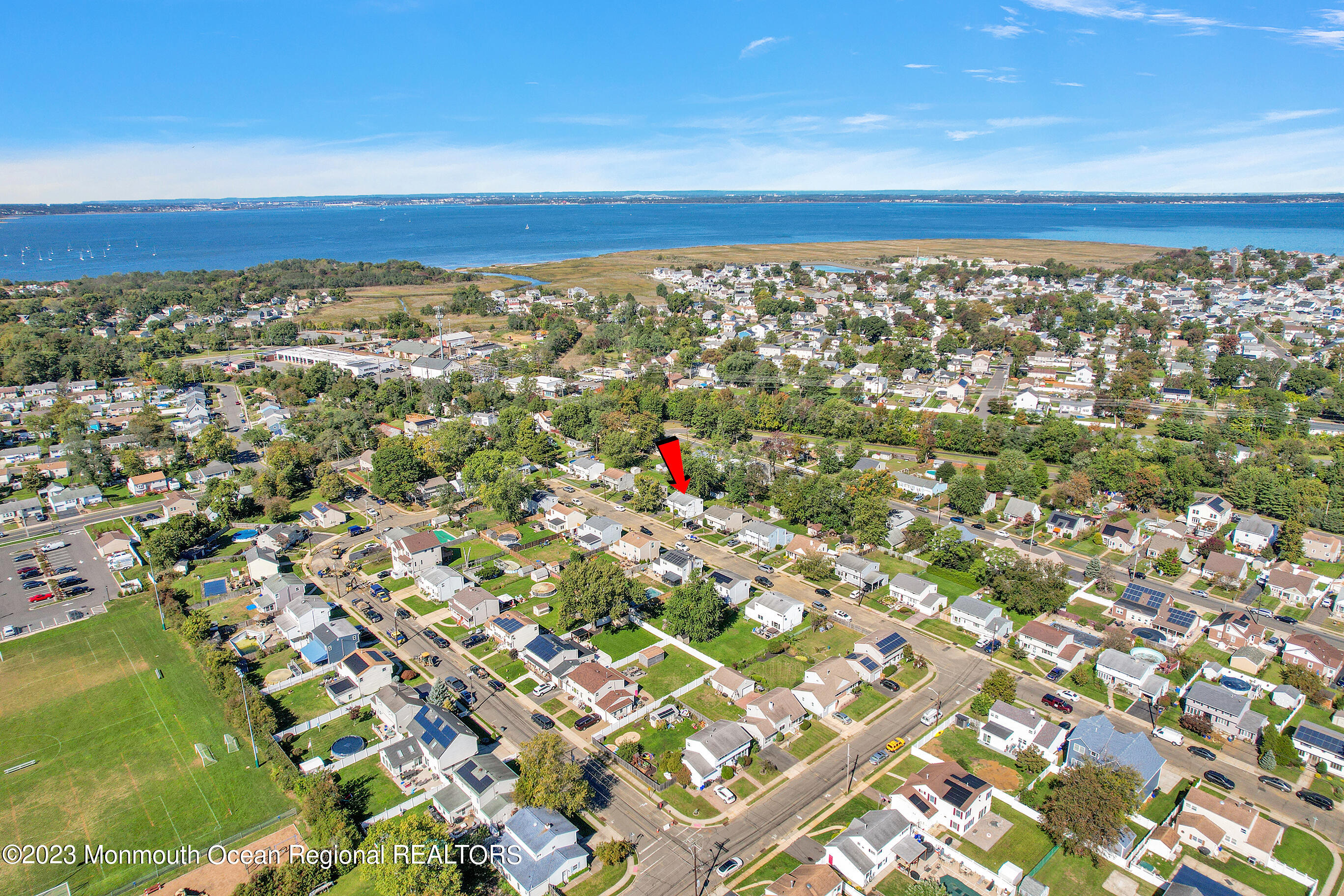 13 Scholer Drive Union Beach, NJ 07735 - Photo 30 of 30 a city view with tall buildings