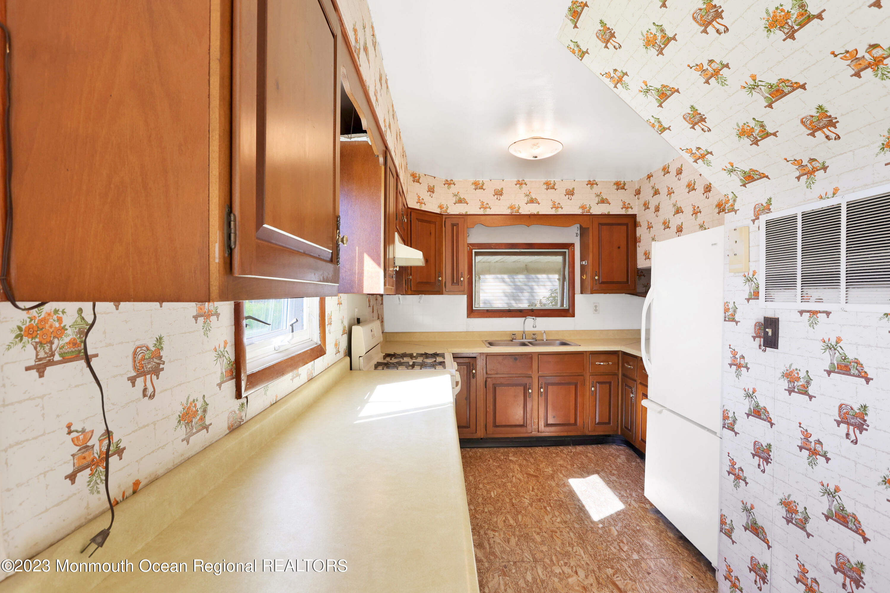13 Scholer Drive Union Beach, NJ 07735 - Photo 8 of 30 a bathroom with a tub sink and mirror