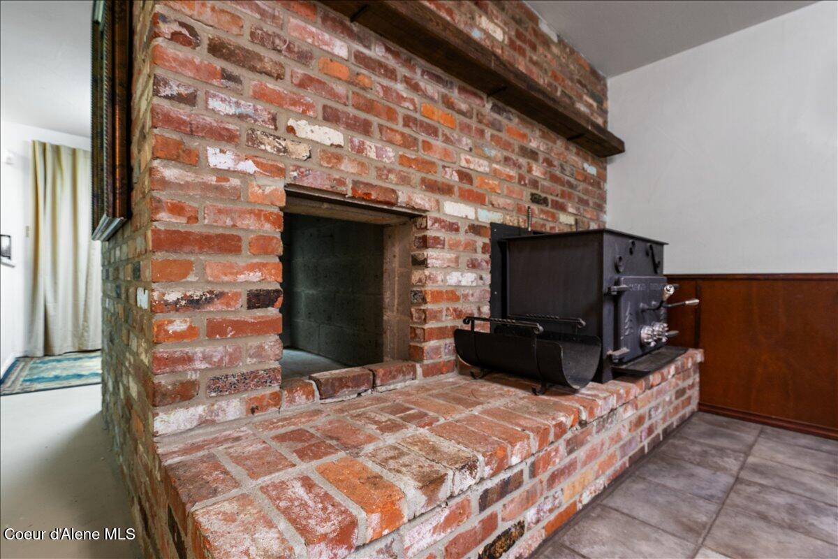 3506 Buckskin Road Coeur D'Alene, ID 83815 - Photo 35 of 65 36-Basement fireplace