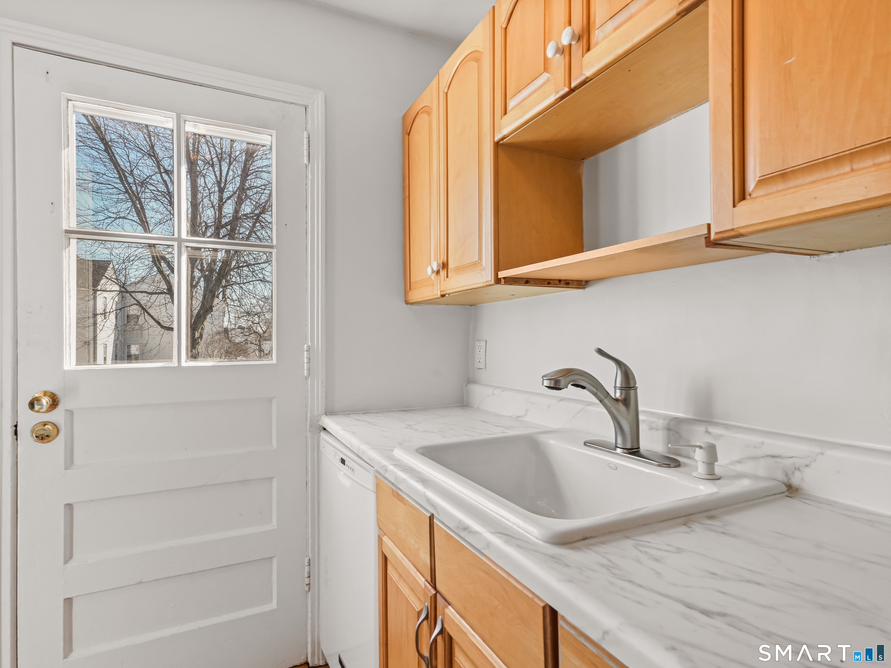 214 Sylvan Knoll Road, Unit 214 Stamford, CT 06902 - Photo 12 of 30 a bathroom with a sink and a window