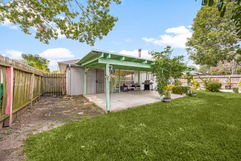 a view of swimming pool with a patio